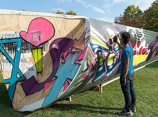 Lewis Garrison painting Berlin Wall architectural installation