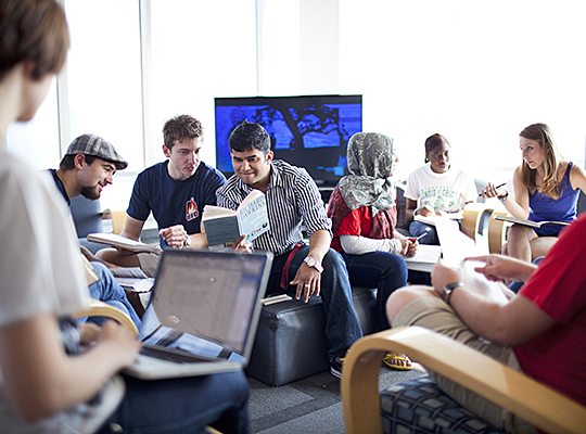 Group of students working in residence hall lounge