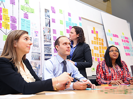 Group of business students working on a project