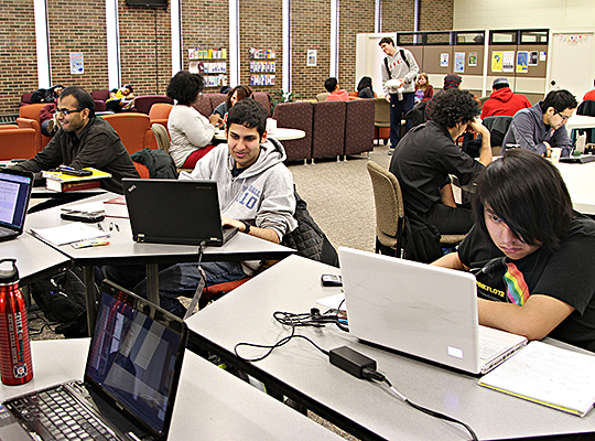 Commuter students work at desks and in chairs