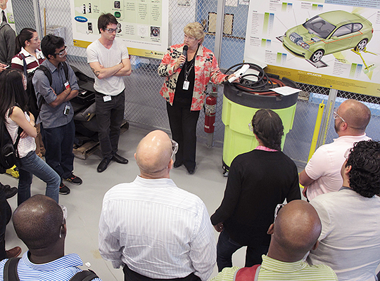 Ann Schlenker giving a tour to a group at Argonne National Laboratory