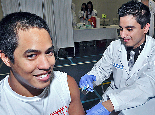 Student recieves a flu shot