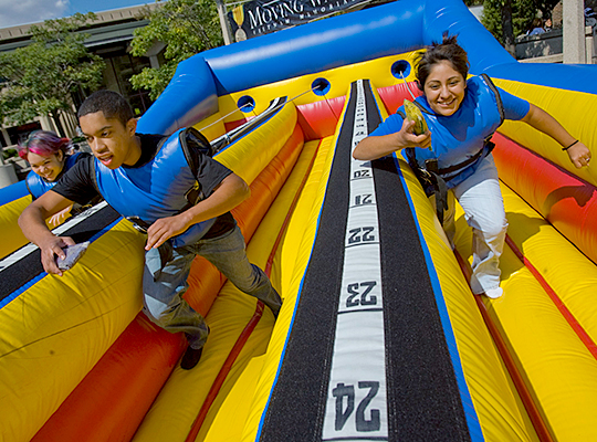 Students race on an obstacle